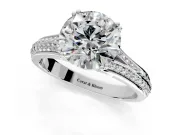 Solitaire Engagement Ring Setting for Round Cut Center with Pave Rail Split Shank and Prong Head in Platinum