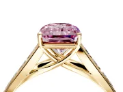 Solitaire Engagement Ring Setting for Fancy Pink Radiant Cut Center with Round Cut Channel Band and Prong Head in Yellow Gold