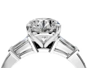 3 Stone Engagement Ring Setting for Round Cut Center with Channel Baguette Accents and Prong Head in Platinum