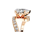 Solitaire Engagement Ring Setting for Pear-Shaped Center with Pave Bypass Swirl Band and Prong Head in Rose Gold
