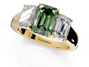 3 Stone Engagement Ring Setting for Fancy Green Emerald Cut Center with Raised Basket Heads and Prong Head in Yellow Gold