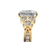 Cluster Engagement Ring Setting for Radiant Cut Center with Bezel Accent Clusters and Prong Head in Yellow Gold