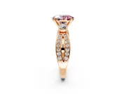 3 Stone Engagement Ring Setting for Fancy Pink Oval Center with Pave Twist Band and Prong Head in Rose Gold