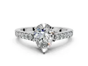 Solitaire Engagement Ring Setting for Pear-Shaped Center with Crossover Accents and Prong Head in Platinum