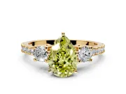 3 Stone Engagement Ring Setting for Fancy Yellow Pear-Shaped Center with Round Cut Side Accents and Prong Head in Yellow Gold