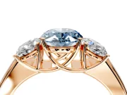 3 Stone Engagement Ring Setting for Fancy Blue Oval Center with Raised Basket Heads and Prong Head in Rose Gold