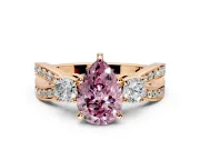 3 Stone Engagement Ring Setting for Fancy Pink Pear-Shaped Center with Pave Twist Band and Prong Head in Rose Gold