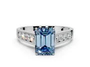 Solitaire Engagement Ring Setting for Fancy Blue Emerald Cut Center with Round Cut Channel Band and Prong Head in Sterling Silver