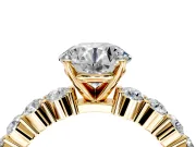 Shared-Prong Engagement Ring Setting for Round Cut Center with Graduated Accents and Prong Head in Yellow Gold
