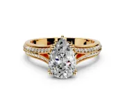 Solitaire Engagement Ring Setting for Pear-Shaped Center with Pave Rail Split Shank and Prong Head in Yellow Gold