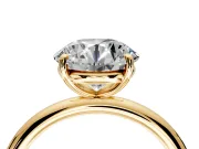 Low-Set Solitaire Engagement Ring Setting for Round Cut Center with Thin Plain Band and Prong Head in Yellow Gold