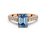 Solitaire Engagement Ring Setting for Fancy Blue Emerald Cut Center with Crossover Accents and Prong Head in Rose Gold