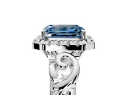 Halo Engagement Ring Setting for Fancy Blue Emerald Cut Center with Open Scroll Shoulders and Prong Head in Platinum