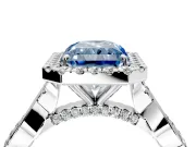 Halo Engagement Ring Setting for Fancy Blue Radiant Cut Center with Twist Band and Prong Head in Platinum