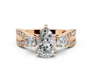 3 Stone Engagement Ring Setting for Pear-Shaped Center with Pave Twist Band and Prong Head in Rose Gold