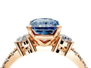3 Stone Engagement Ring Setting for Fancy Blue Radiant Cut Center with Round Cut Side Accents and Prong Head in Rose Gold