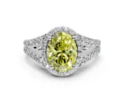 Halo Engagement Ring Setting for Fancy Yellow Oval Center with Narrow Pave Split Shank and Prong Head in White Gold