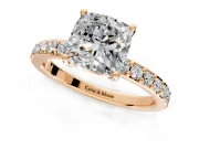 Solitaire Engagement Ring Setting for Cushion Cut Center with Round Cut Pave Band and Prong Head in Rose Gold