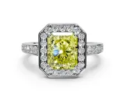 Bezel-Framed Halo Engagement Ring Setting for Fancy Yellow Radiant Cut Center with Pave Band and Prong Head in Sterling Silver