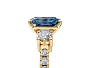 3 Stone Engagement Ring Setting for Fancy Blue Emerald Cut Center with Round Cut Side Accents and Prong Head in Yellow Gold