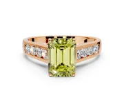 Solitaire Engagement Ring Setting for Fancy Yellow Emerald Cut Center with Round Cut Channel Band and Prong Head in Rose Gold