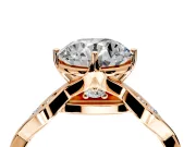 Solitaire Engagement Ring Setting for Round Cut Center with Accented Twist Band and Leaf Prong Head in Rose Gold