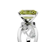 Solitaire Engagement Ring Setting for Fancy Yellow Emerald Cut Center with Criss-Cross Accent Band and Prong Head in Platinum