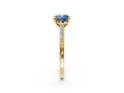 Solitaire Engagement Ring Setting for Fancy Blue Cushion Cut Center with Channel Accents and Prong Head in Yellow Gold