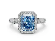 Halo Engagement Ring Setting for Fancy Blue Radiant Cut Center with Heart-Shaped Openwork, Pave Band and Prong Head in White Gold