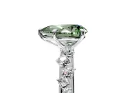 Cluster Engagement Ring Setting for Fancy Green Pear-Shaped Center with Round Cut Accent Band and Prong Head in Sterling Silver