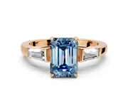 3 Stone Engagement Ring Setting for Fancy Blue Emerald Cut Center with Baguette Accents and Prong Head in Rose Gold