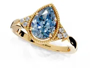 Cluster Engagement Ring Setting for Fancy Blue Pear-Shaped Center with Milgrain Shoulder Clusters and Prong Head in Yellow Gold