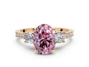 3 Stone Engagement Ring Setting for Fancy Pink Oval Center with Round Cut Side Accents and Prong Head in Rose Gold