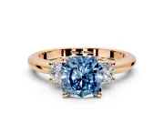 3 Stone Engagement Ring Setting for Fancy Blue Cushion Cut Center with Wide Plain Band and Prong Head in Rose Gold