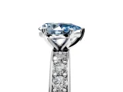 Solitaire Engagement Ring Setting for Fancy Blue Pear-Shaped Center with Channel-Set Accents and Prong Head in White Gold