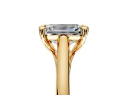Solitaire Engagement Ring Setting for Emerald Cut Center with Cathedral Band and Prong Head in Yellow Gold