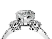 3 Stone Engagement Ring Setting for Heart-Shaped Center with Round Cut Side Accents and Prong Head in Platinum