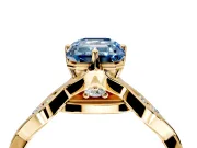Solitaire Engagement Ring Setting for Fancy Blue Emerald Cut Center with Accented Twist Band and Leaf Prong Head in Yellow Gold