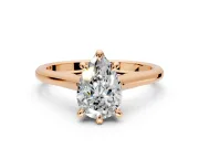 Solitaire Engagement Ring Setting for Pear-Shaped Center with Cathedral Band and Prong Head in Rose Gold