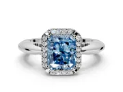 Halo Engagement Ring Setting for Fancy Blue Radiant Cut Center with Tapered Plain Band and Prong Head in White Gold