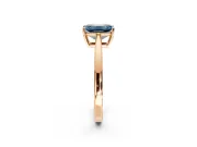 Solitaire Engagement Ring Setting for Fancy Blue Emerald Cut Center with Open Cathedral Shoulders and Prong Head in Rose Gold