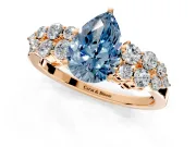Cluster Engagement Ring Setting for Fancy Blue Pear-Shaped Center with 2-Row Shoulder Clusters and Prong Head in Rose Gold