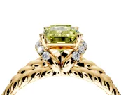 Halo Engagement Ring Setting for Fancy Yellow Emerald Cut Center with Rope Twist Split Shank and Prong Head in Yellow Gold