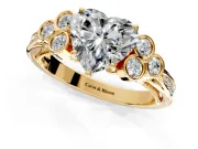 Cluster Engagement Ring Setting for Heart-Shaped Center with Bezel Accent Clusters and Prong Head in Yellow Gold