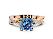 Crossover Engagement Ring Setting for Fancy Blue Cushion Cut Center with Pave and Plain Strands and Prong Head in Rose Gold