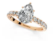 Solitaire Engagement Ring Setting for Pear-Shaped Center with Large Accent Band and Prong Head in Rose Gold