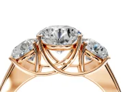 3 Stone Engagement Ring Setting for Round Cut Center with Raised Basket Heads and Prong Head in Rose Gold