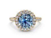Halo Engagement Ring Setting for Fancy Blue Round Cut Center with Narrowing Pave Band and Prong Head in Yellow Gold
