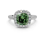 Halo Engagement Ring Setting for Fancy Green Cushion Cut Center with Narrowing Pave Band and Prong Head in Platinum
