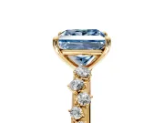 Cluster Engagement Ring Setting for Fancy Blue Princess Cut Center with Round Cut Accent Band and Prong Head in Yellow Gold